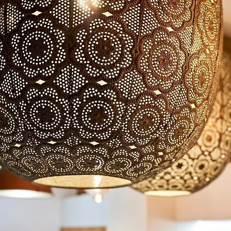 In The Center Of Next To The *