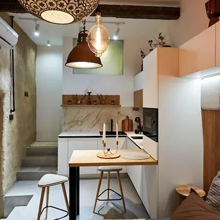 In The Center Of Next To The *