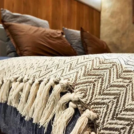 In The Center Of Next To The *